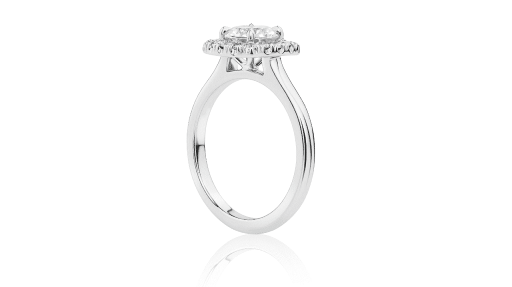 round_diamond_halo_engagement_ring_side_view.png