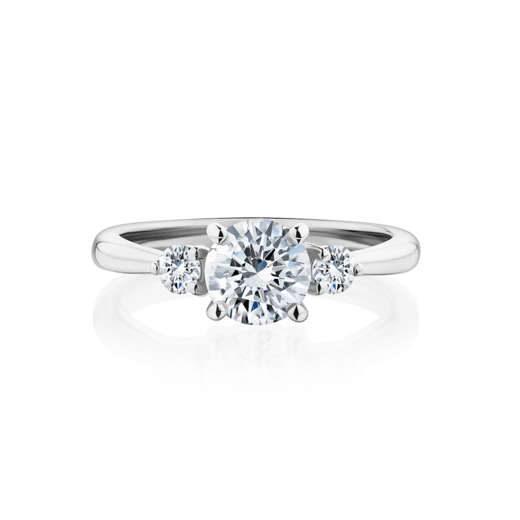 Frangipani-round-cut-platinum-trilogy-diamond-engagement-ring