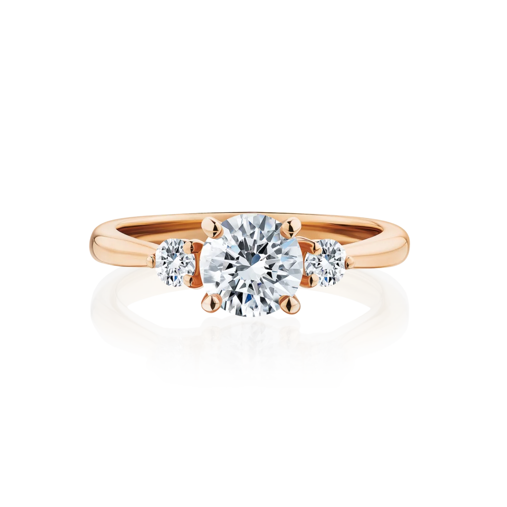 Frangipani-round-cut-rose-gold-trilogy-diamond-engagement-ring